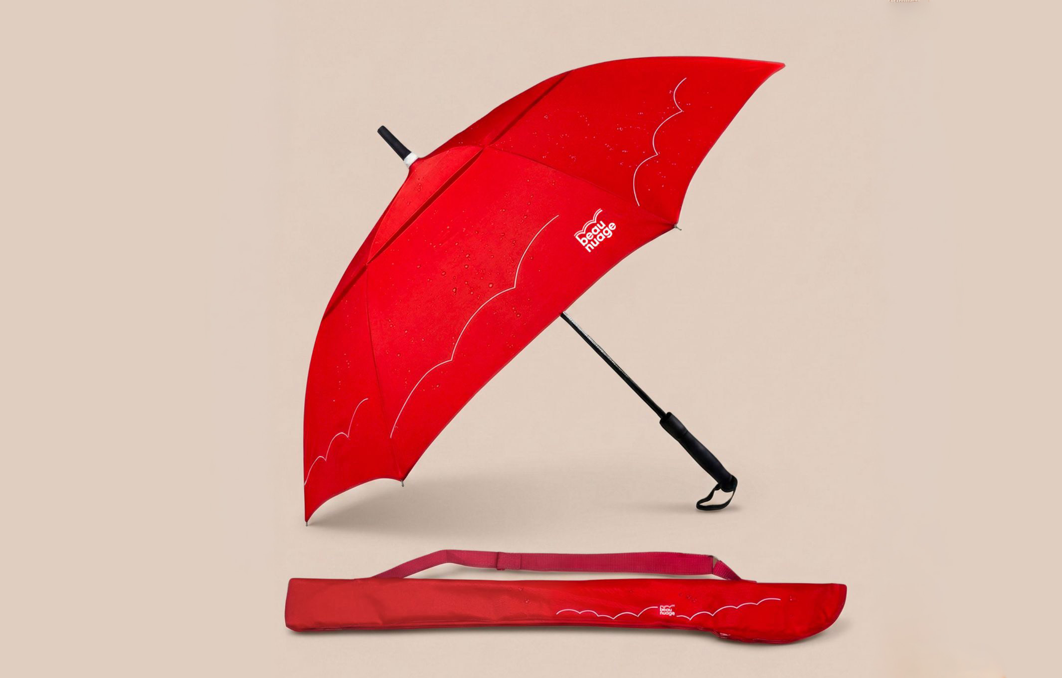 The Gentleman — large Beau Nuage umbrella worn across the shoulder
